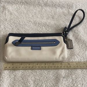 All leather Cream with blue accent Coach wristlet